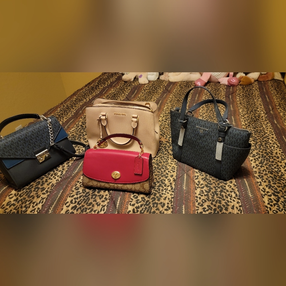 Gently used authentic handbags by Michael Kors and 1 Coach handbags